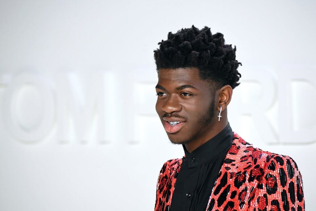 black gay music artist Lil Nas X.  He has gone against the grain by being openly gay in the hip hop industry